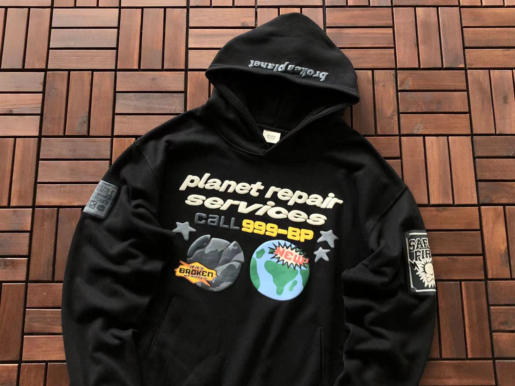 Broken Planet Hoodie "planet repair services"