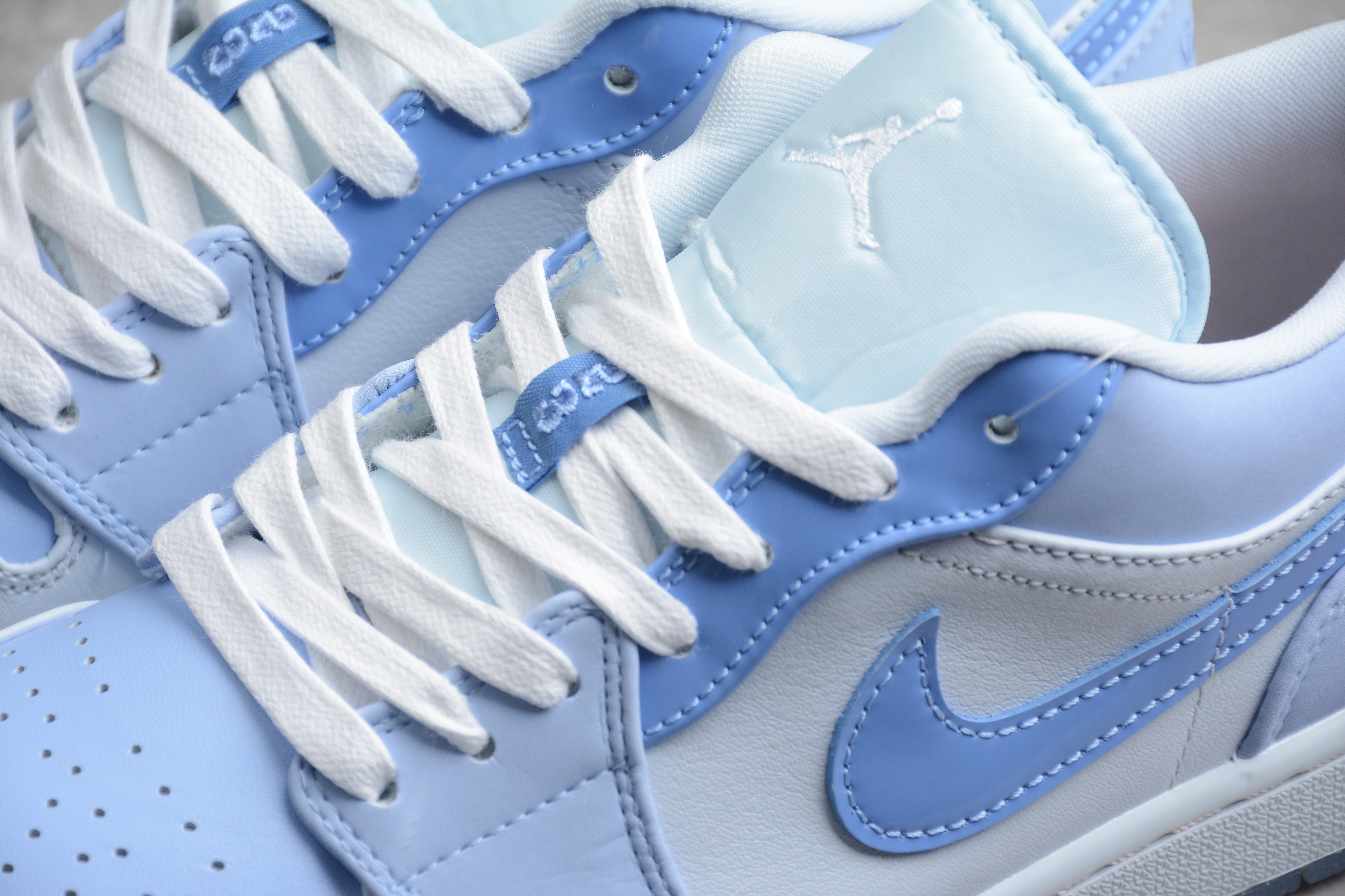 Jordan 1 Low SE Mighty Swooshers