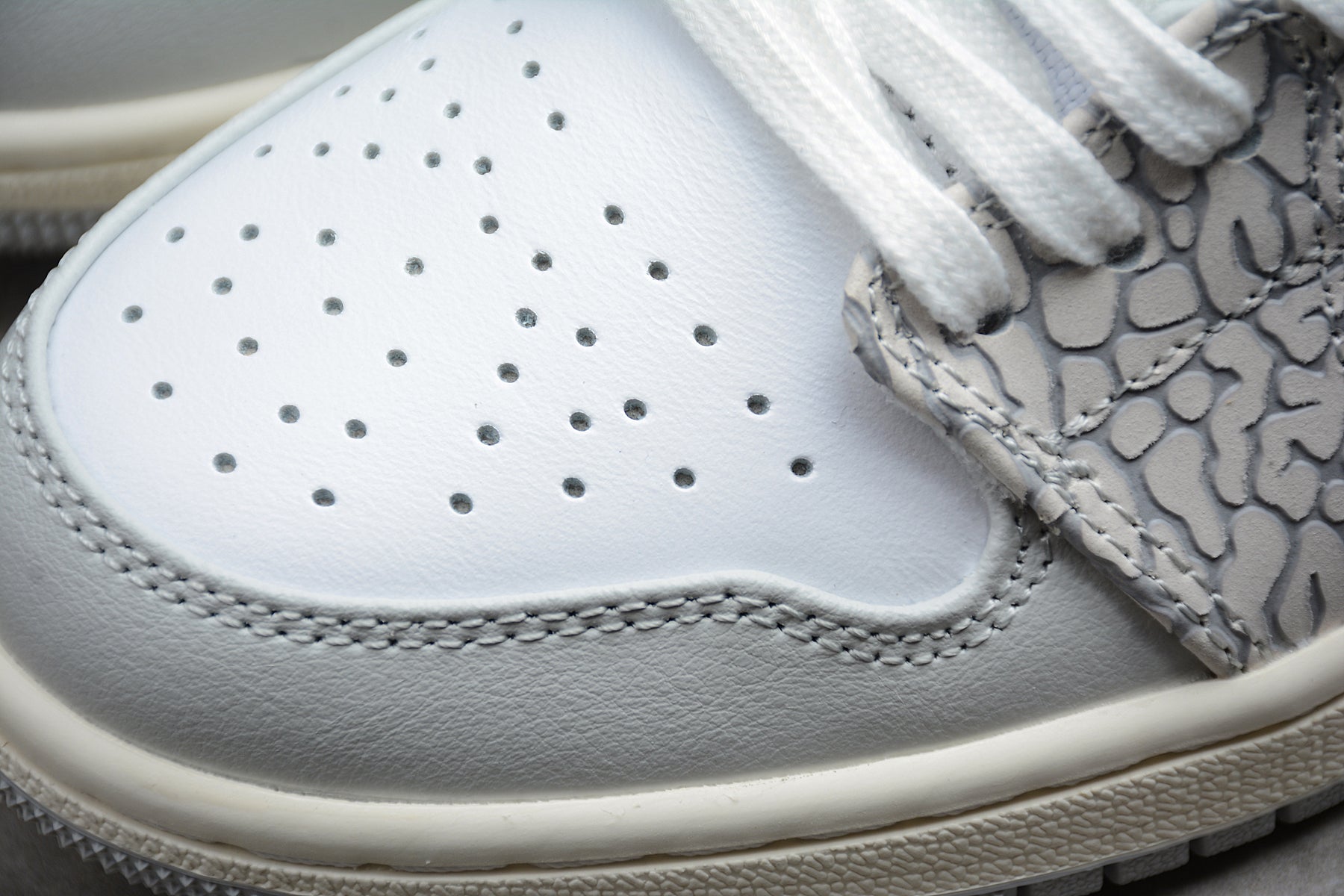 Jordan 1 Low PRM Smoke Grey Elephants