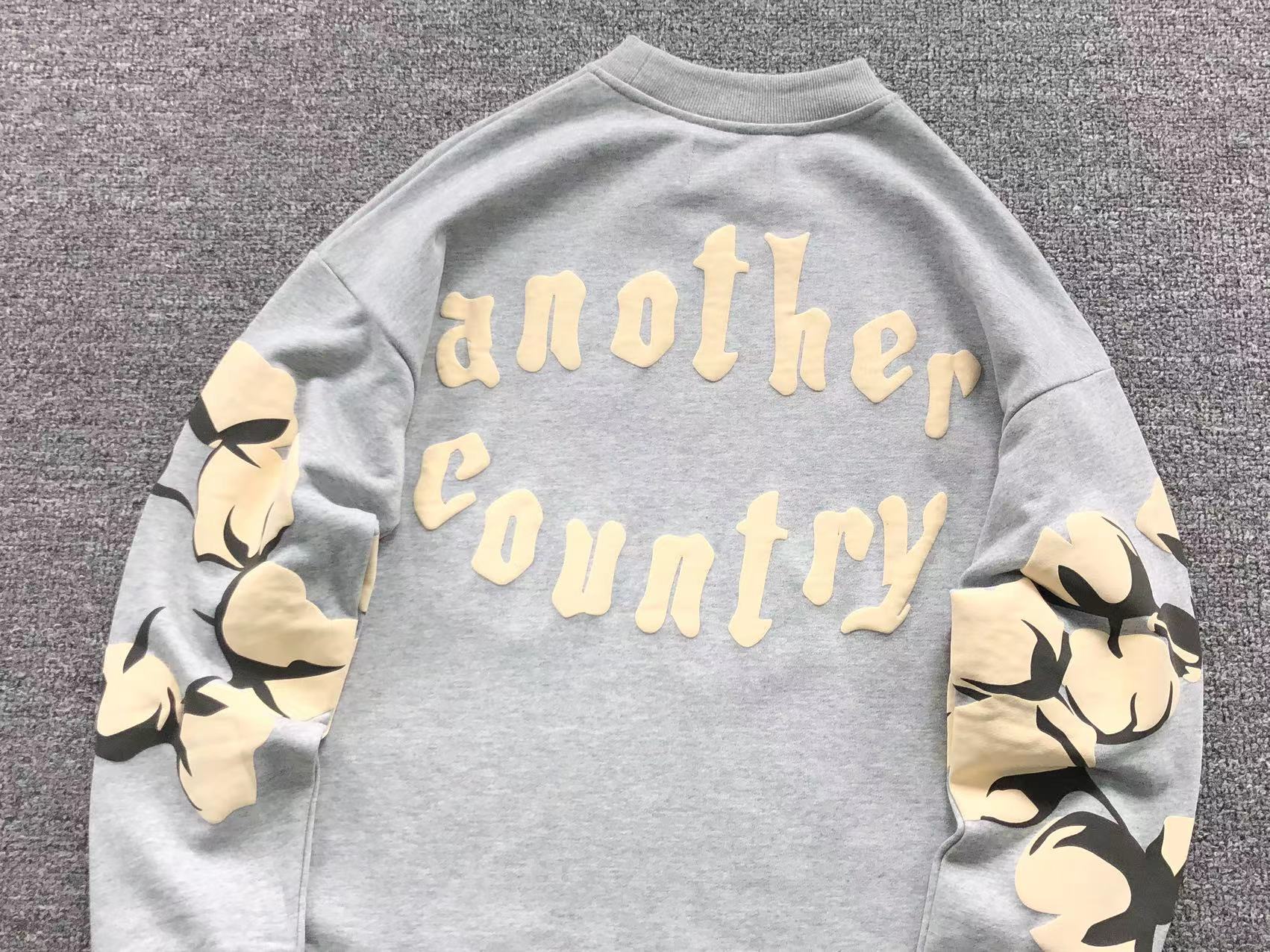 Denim Tears Sweat "Another Country" Cinzento