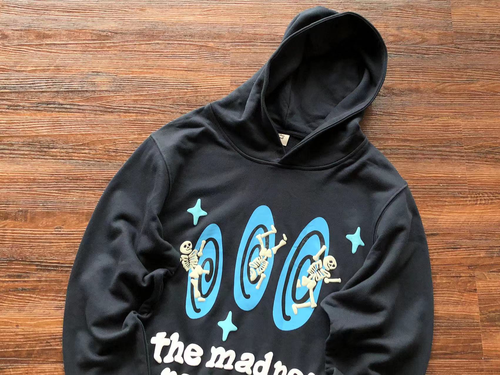 Broken Planet Hoodie "the madness never ends"