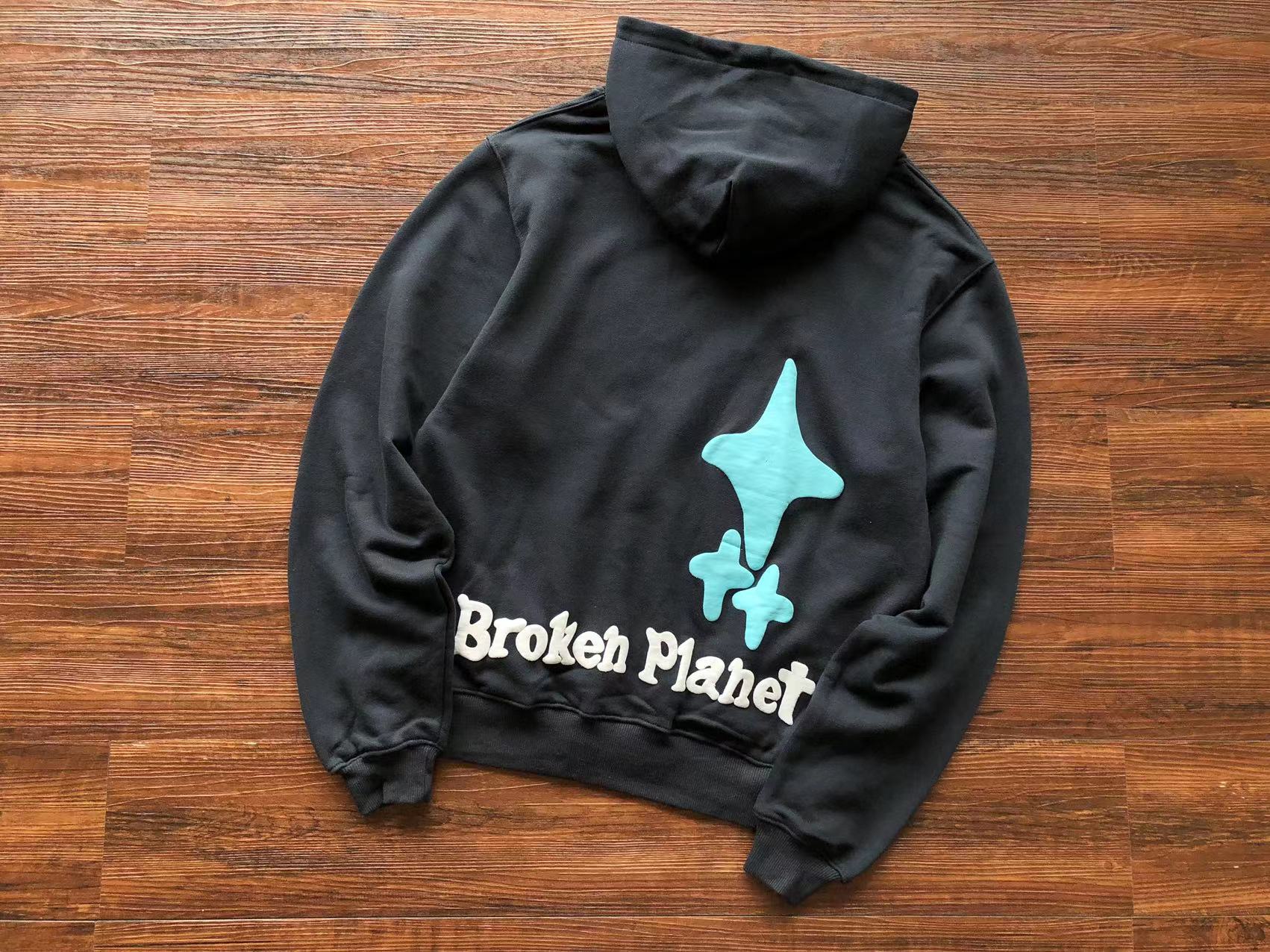 Broken Planet Hoodie "the madness never ends"