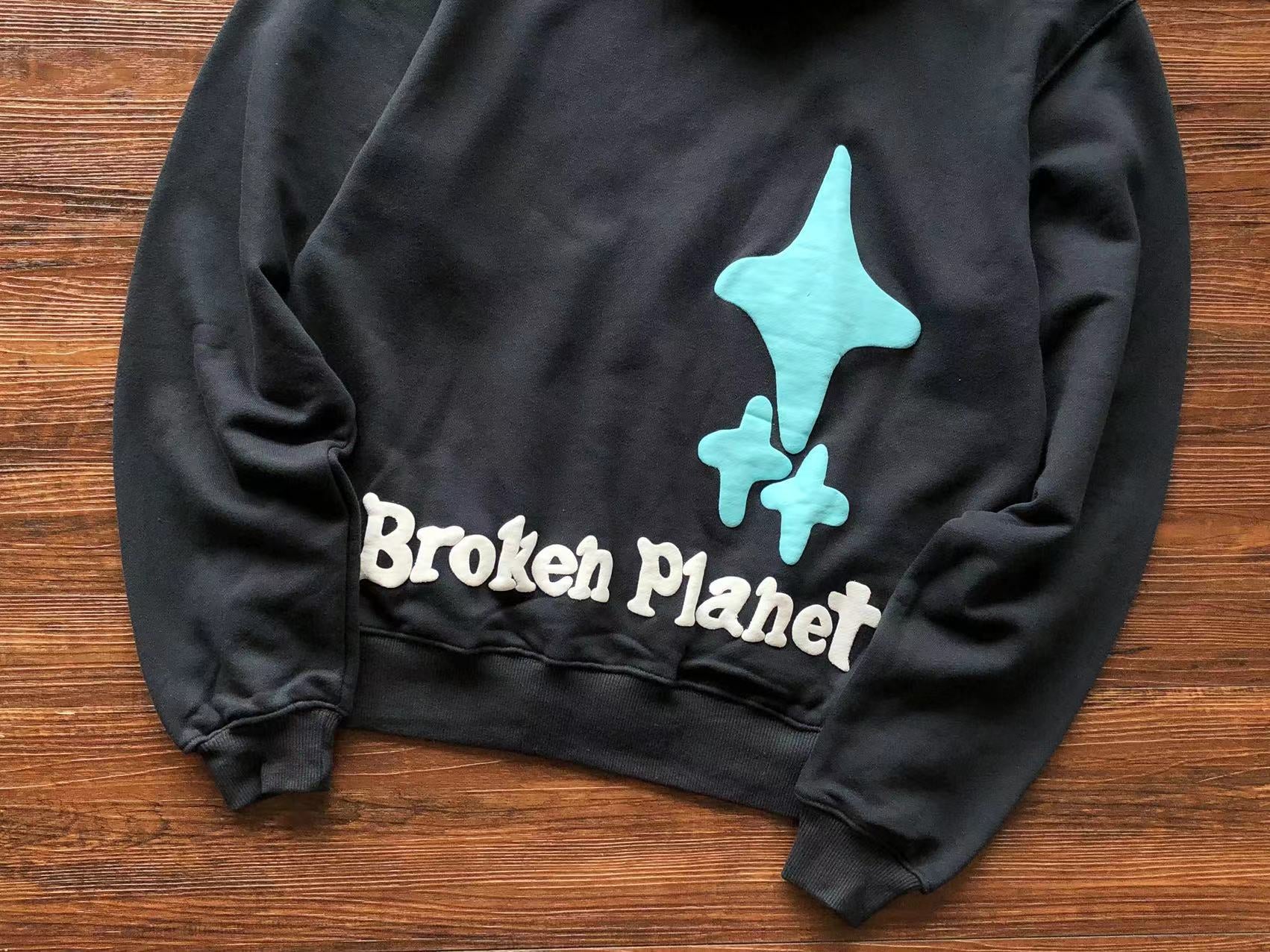 Broken Planet Hoodie "the madness never ends"