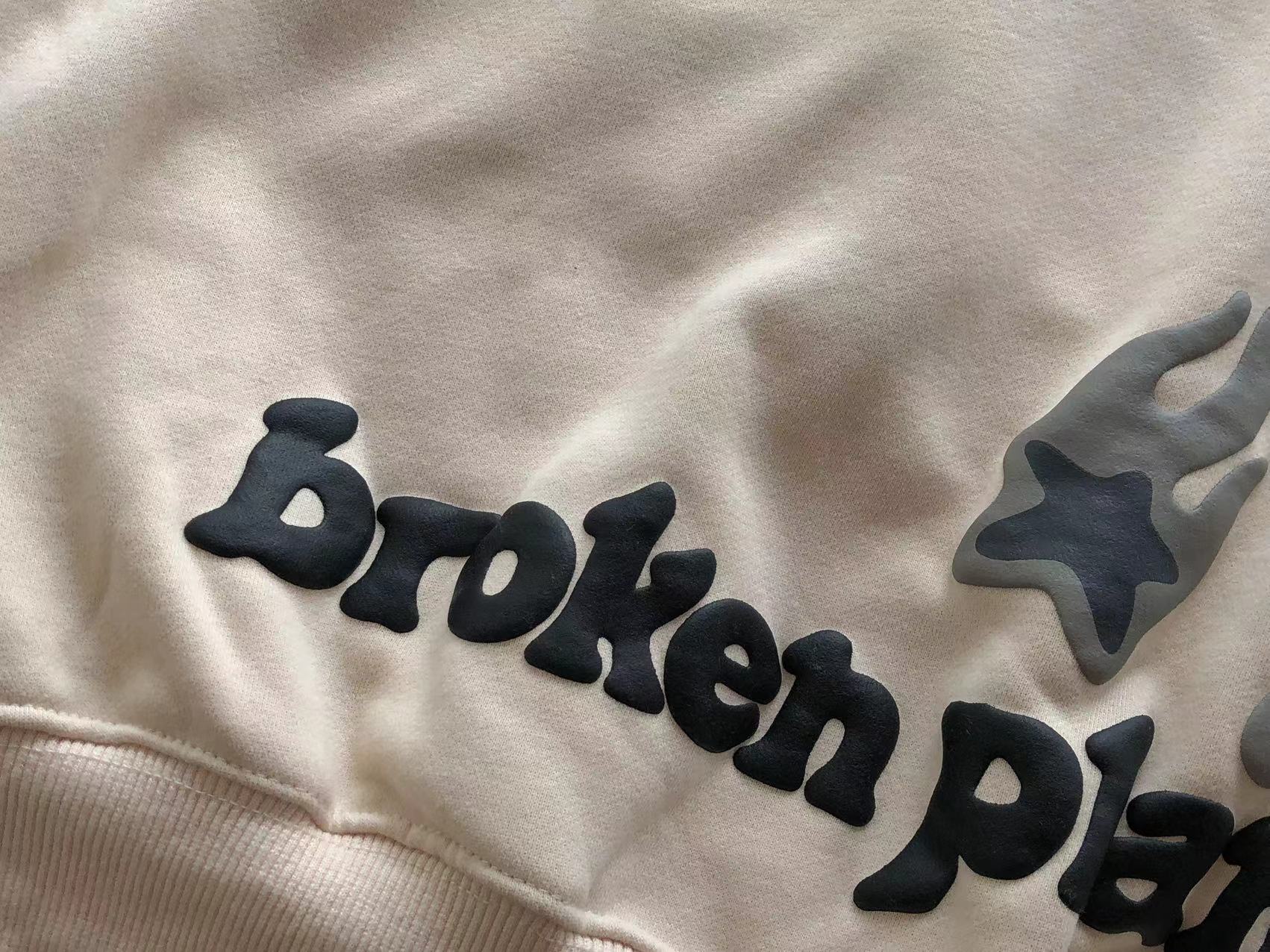 Broken Planet Hoodie "heartless love"