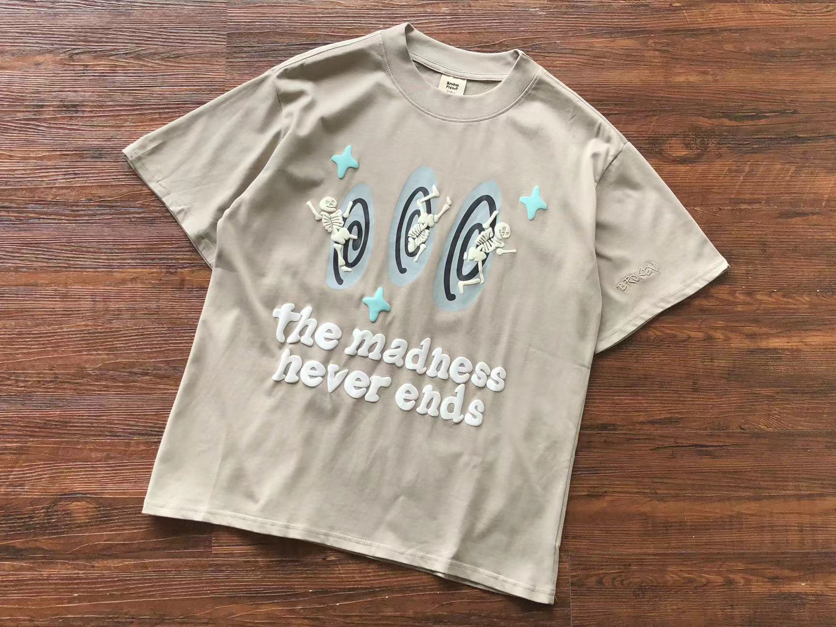 T-Shirt Broken Planet The madness never ends